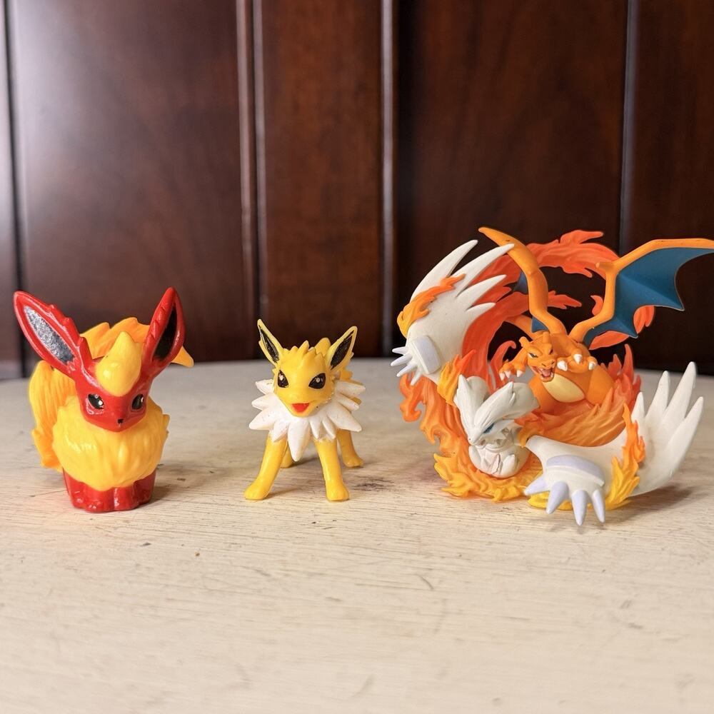 Pokemon TOMY Flareon - Jolteon - Charizard & Reshiram Figures Nintendo Lot Of 3